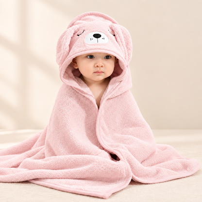 Pink baby towel on beige background