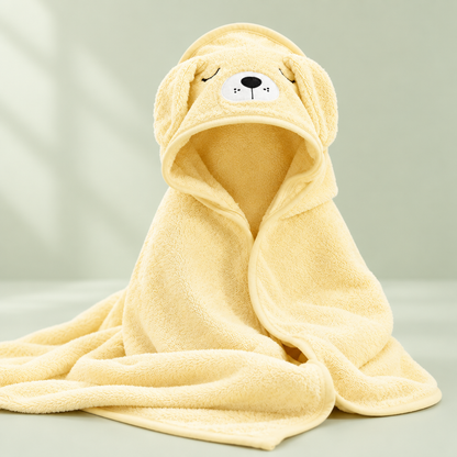 Yellow baby towel on sage background